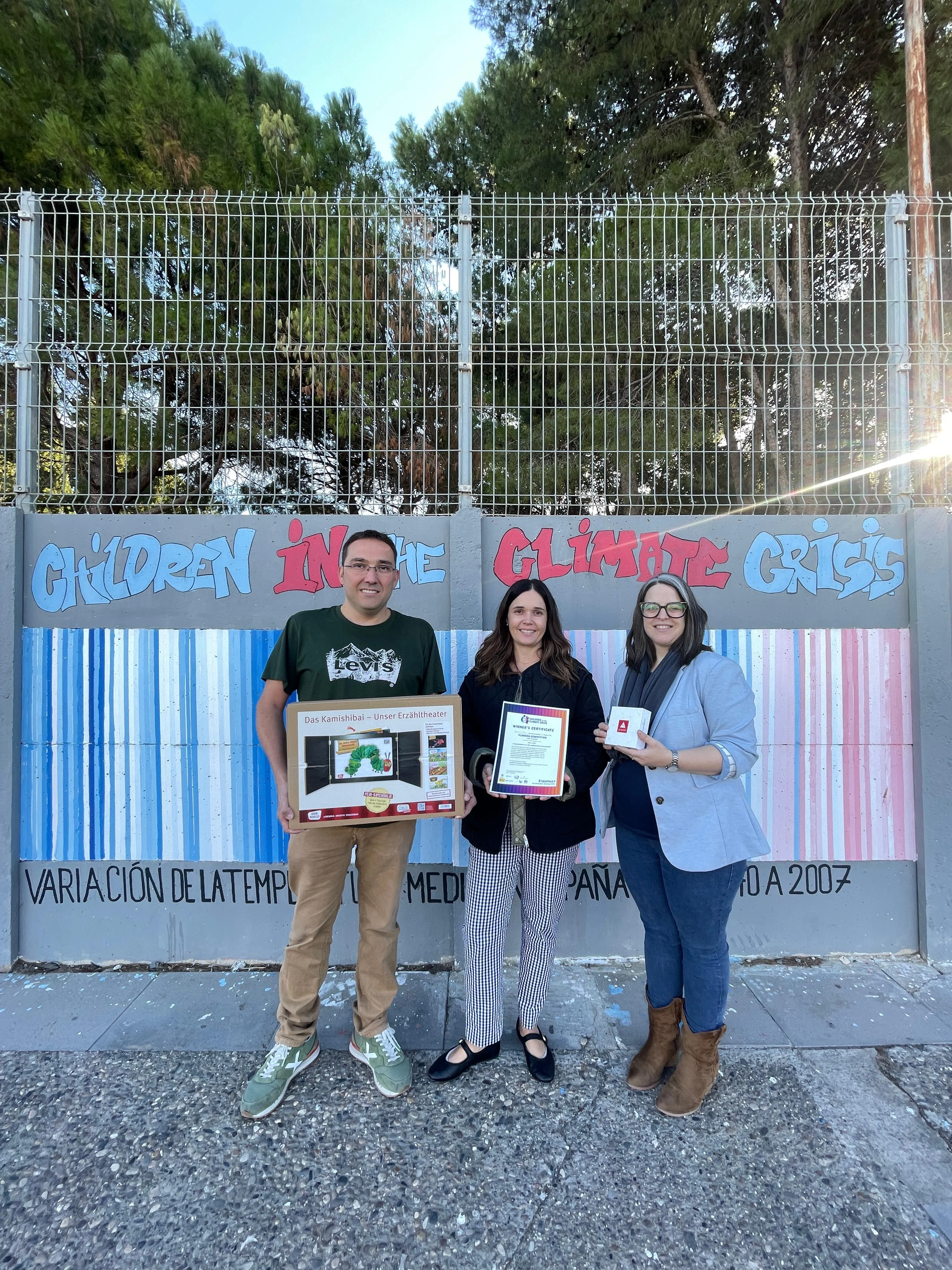 Kahadija Chellay pictured with two of her mentors